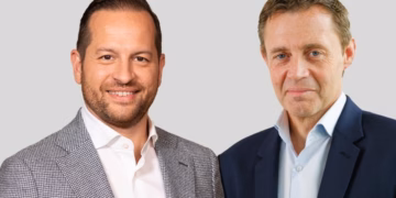 CEO Delhaize Xavier Piesvaux geeft de fakkel door bij Delhaize